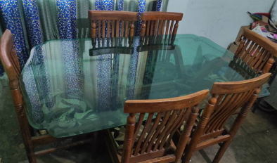 Dining table with 6 chairs and tinted glass top 6ft almost new for sale